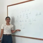 A Thai language teacher at the whiteboard