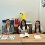 Students and their teacher in the classroom