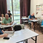 Students and their teacher in the classroom