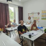 Students and their teacher in the classroom