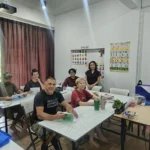 A Thai language teacher with a group of students