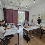 Students and their teacher at Thai Voice Language School
